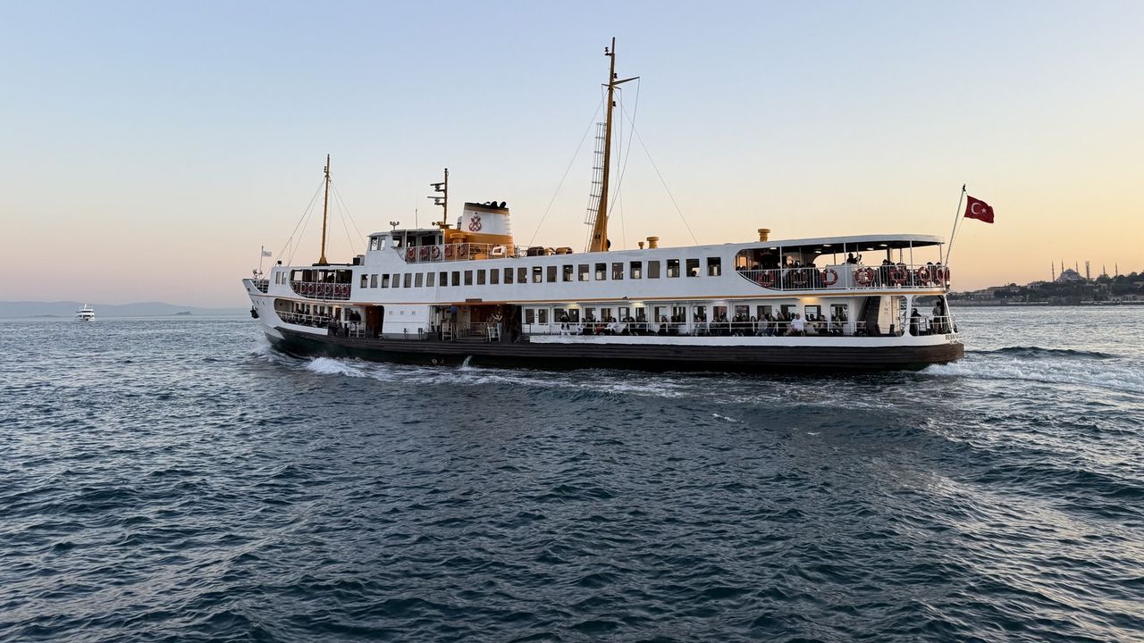 A Sehir Hatlari commuter ferry crossing in front of Istanbul's Old City