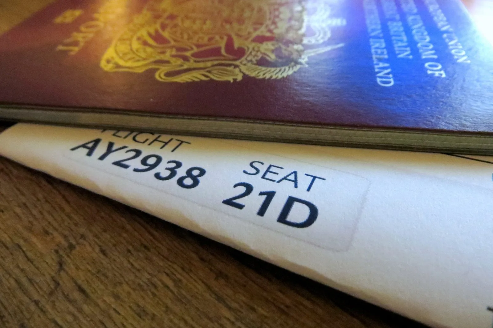Picture of passport and boarding pass.