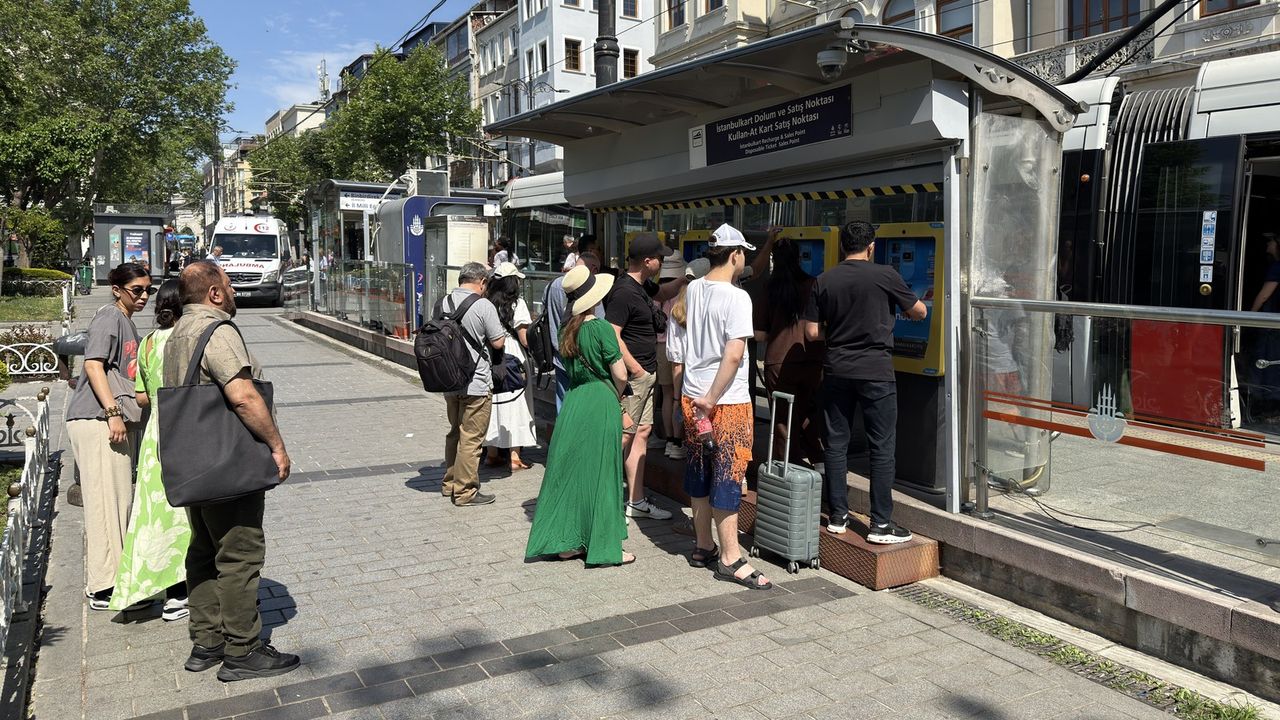 Travellers queueing at an Istanbulkart recharge and sales point in Istanbul