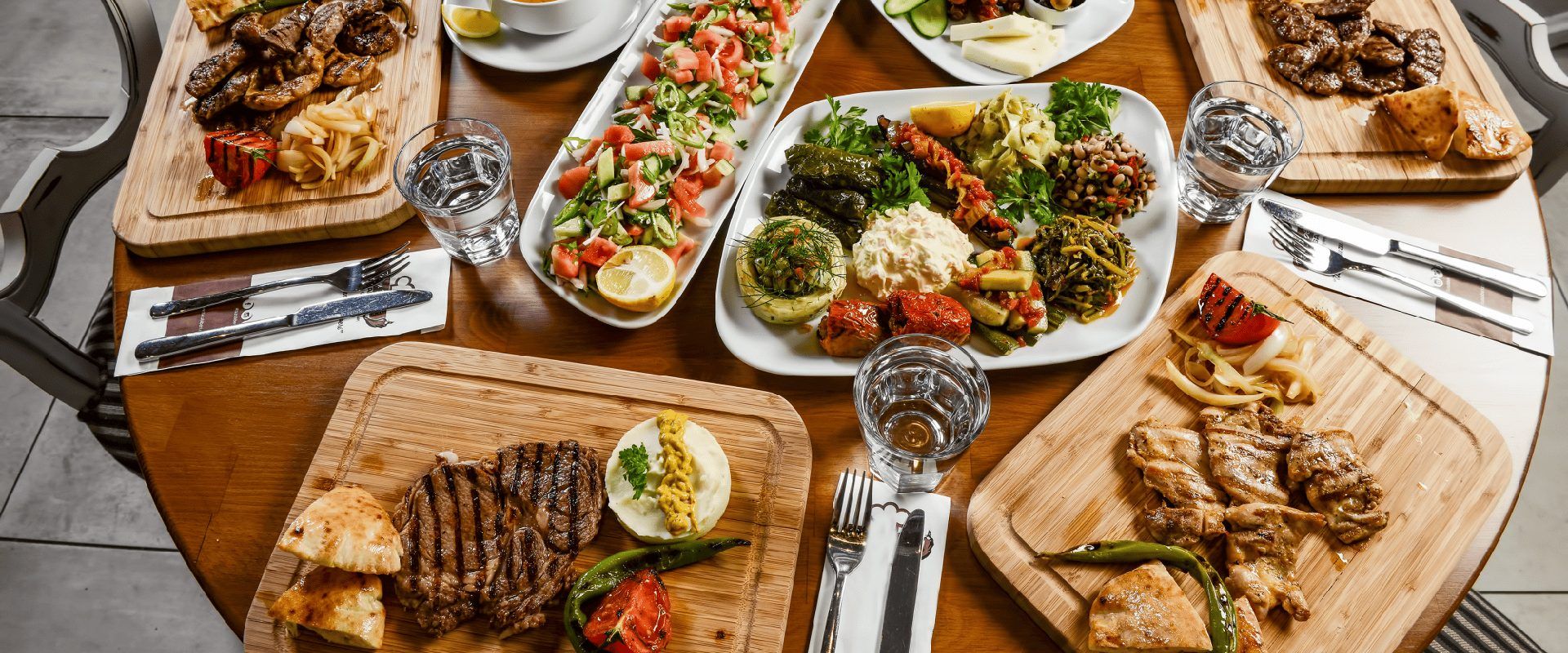 Table with different typical Turkish food dishes.