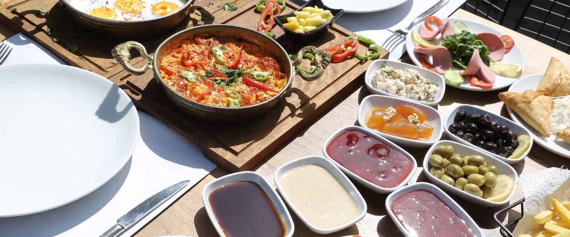 Typical Turkish breakfast with menemen.