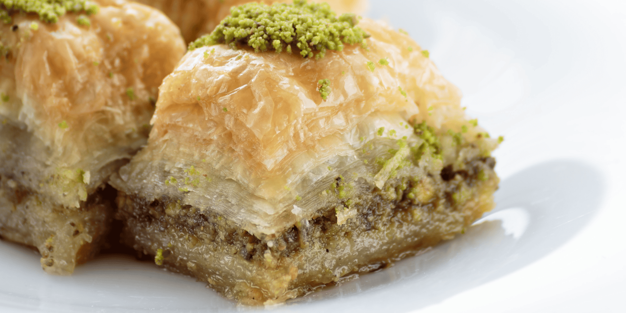 Portion of baklava nicely presented on plate.