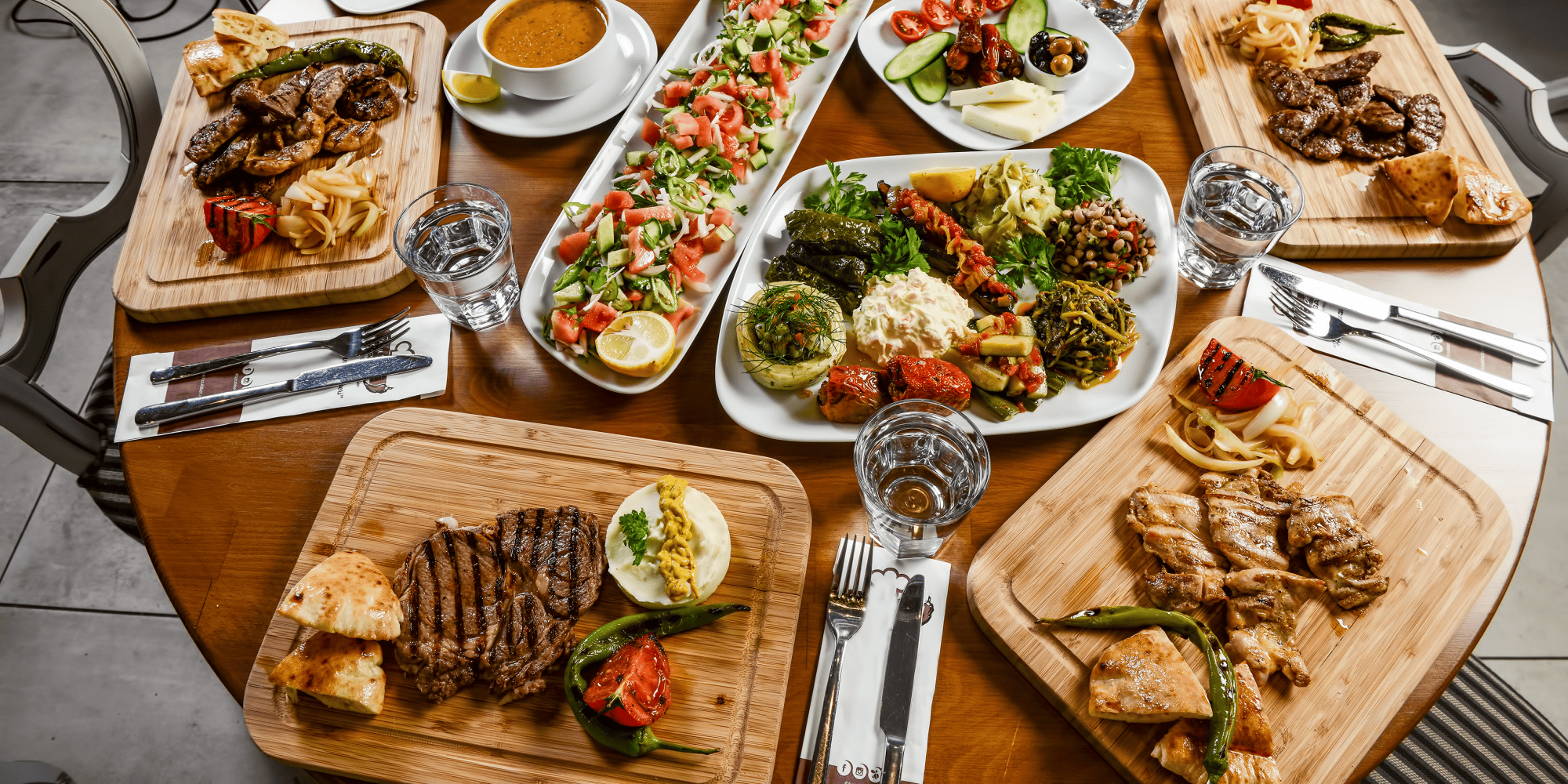 Table with different typical Turkish food dishes.